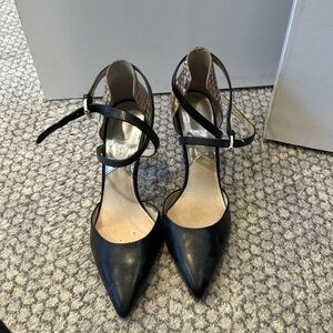 Black and snake skin X heel